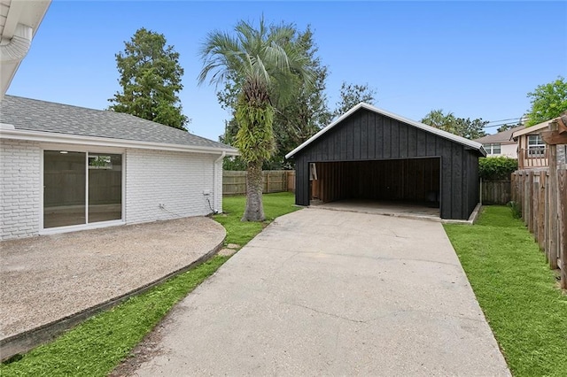 garage with a yard