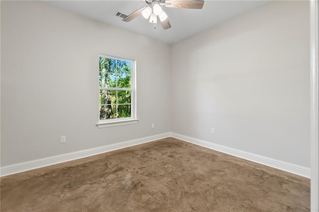 spare room with ceiling fan and carpet flooring