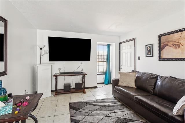 living room with light tile patterned floors