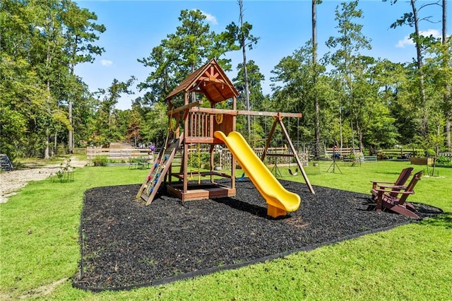 view of jungle gym with a lawn