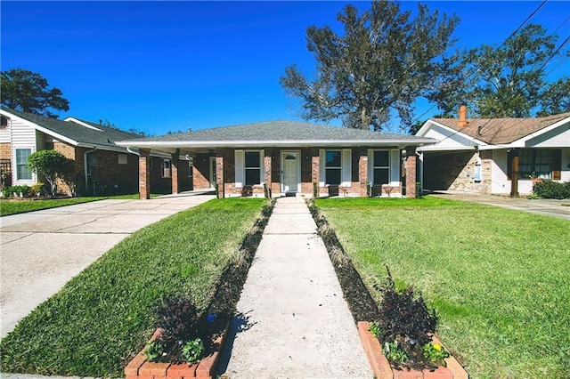 ranch-style house with a front lawn and a carport