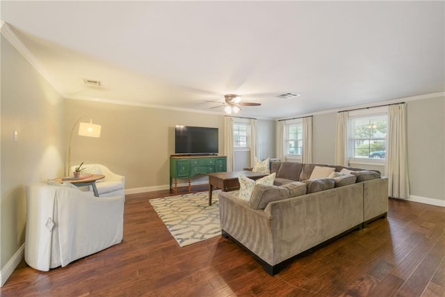 living room featuring ceiling fan, crown molding, and dark hardwood / wood-style flooring