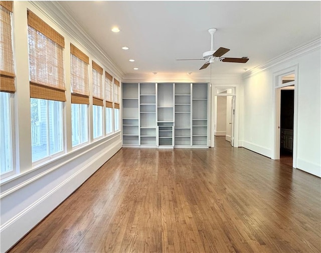 unfurnished room featuring ornamental molding, dark hardwood / wood-style floors, and ceiling fan