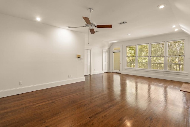 73527 Military Rd, Covington, LA 70435 - unfurnished living room with lofted ceiling, a ceiling fan, dark wood-style flooring, baseboards, and recessed lighting