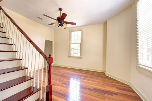 interior space featuring ceiling fan and hardwood / wood-style flooring