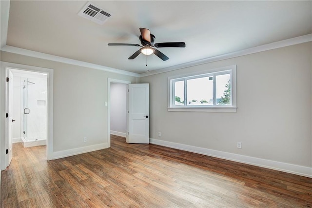 unfurnished room featuring ornamental molding, wood-type flooring, and ceiling fan