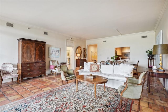 living room featuring crown molding