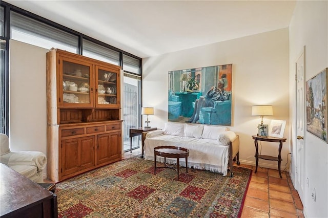 sitting room with floor to ceiling windows