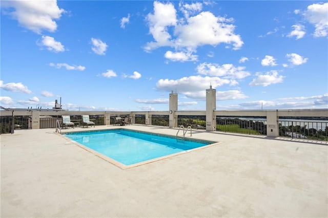 view of pool with a patio