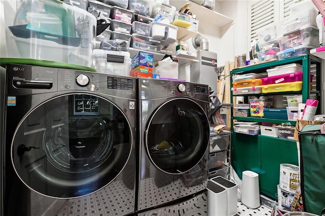 laundry area featuring washing machine and dryer