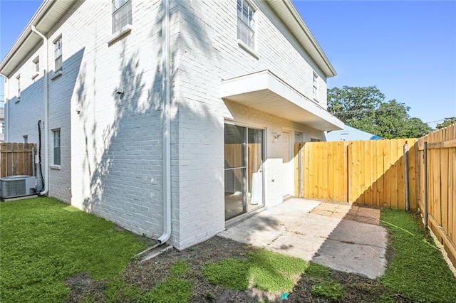 view of property exterior with a yard