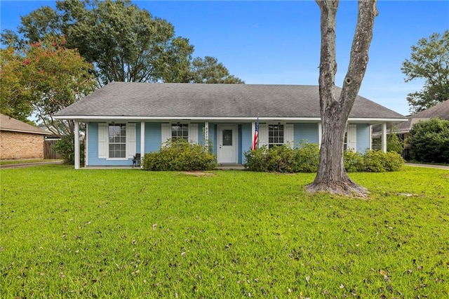 ranch-style home featuring a front yard