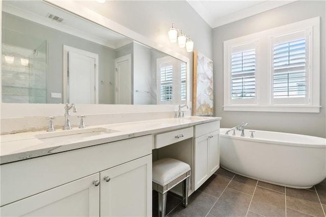 bathroom with independent shower and bath, crown molding, vanity, and tile patterned floors