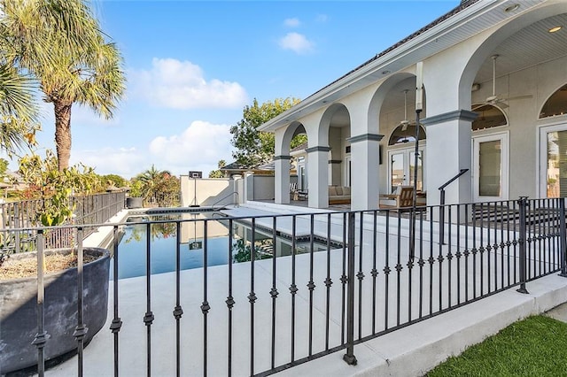 view of gate featuring a fenced in pool