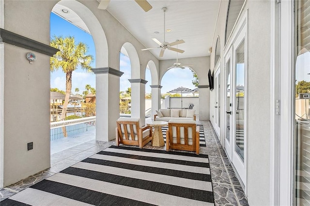 view of patio / terrace with an outdoor hangout area and ceiling fan