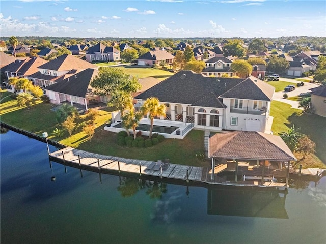 bird's eye view with a water view