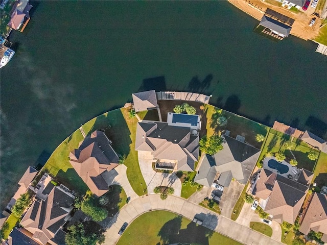 birds eye view of property featuring a water view