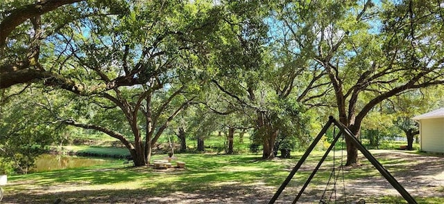 view of yard with a water view