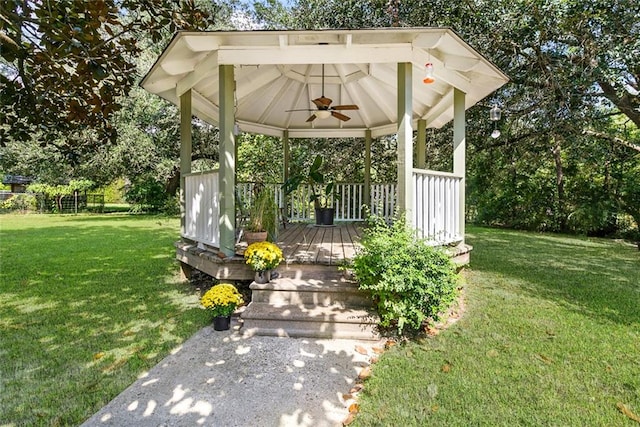 view of yard featuring ceiling fan