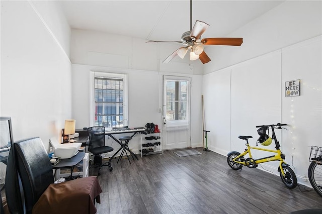 office area featuring dark hardwood / wood-style floors and ceiling fan