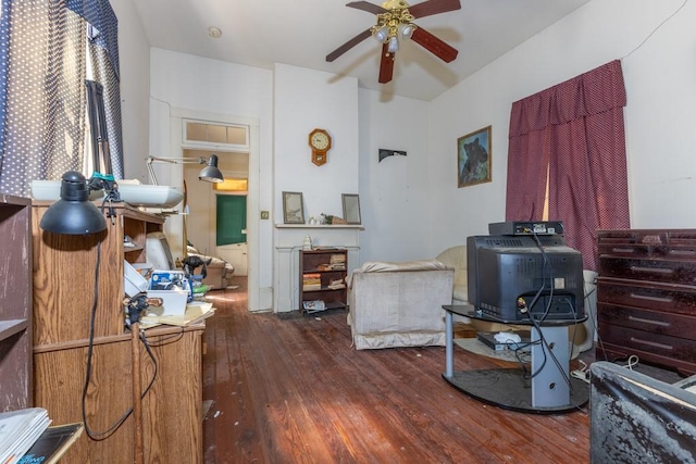 office area with ceiling fan and dark hardwood / wood-style flooring