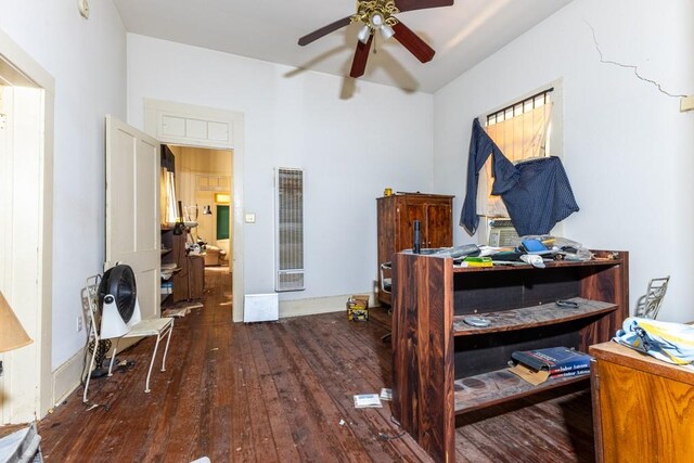 bedroom with ceiling fan and dark hardwood / wood-style floors