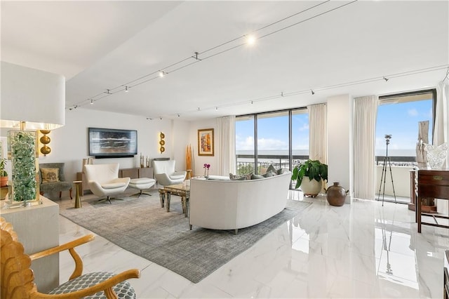 living room featuring a water view