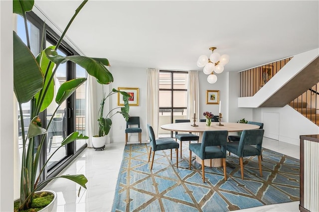 dining room featuring a notable chandelier