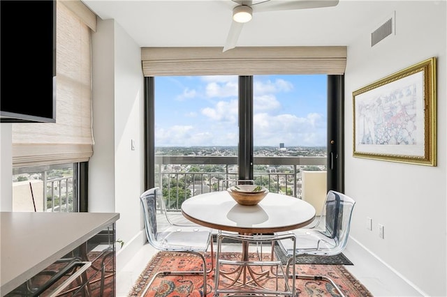 dining room with ceiling fan