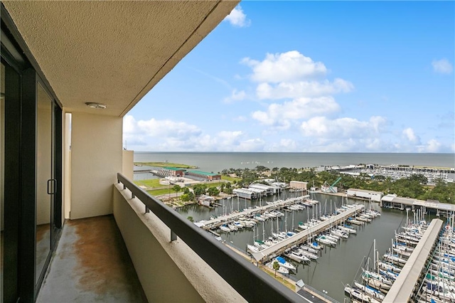 balcony featuring a water view