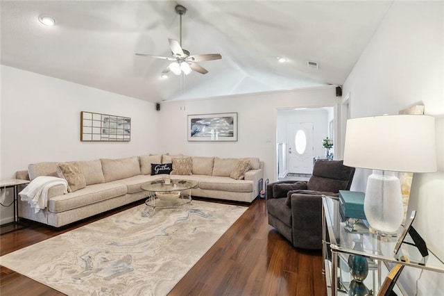 living room featuring vaulted ceiling, ceiling fan, and dark hardwood / wood-style floors