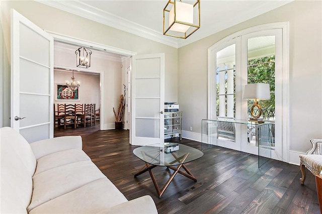 living room with dark wood-type flooring, french doors, and a wealth of natural light