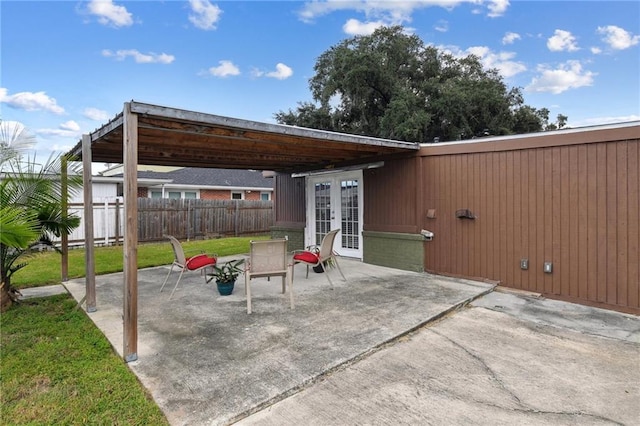 view of patio featuring french doors