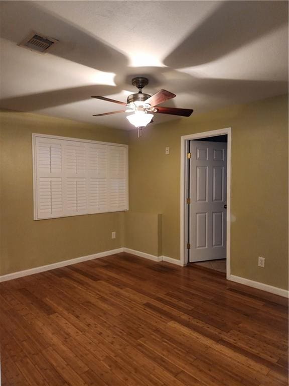 bedroom with ceiling fan and hardwood / wood-style flooring