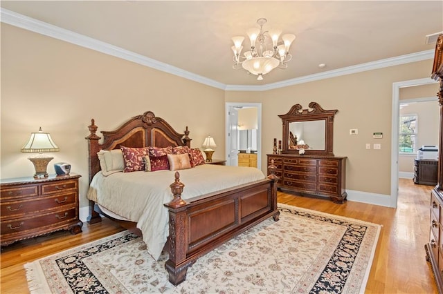 bedroom with ornamental molding, light wood-type flooring, and ensuite bathroom