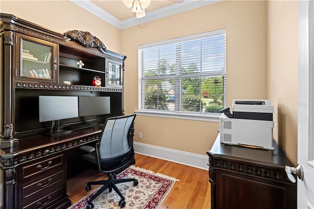 home office with ceiling fan, light wood-type flooring, and ornamental molding