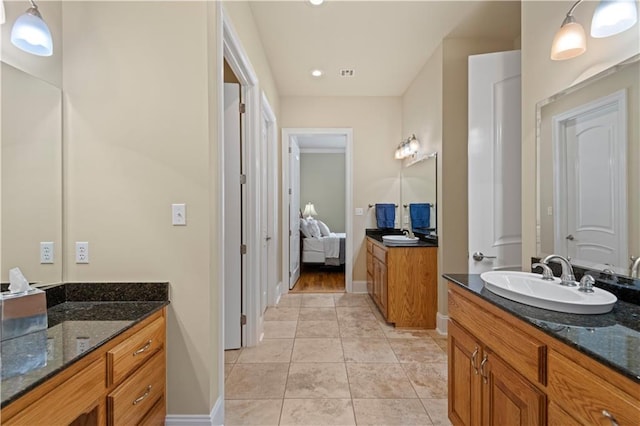 bathroom featuring vanity and tile patterned floors