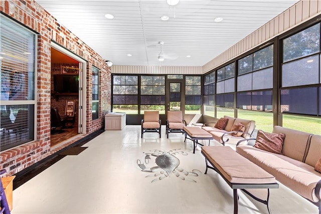 sunroom / solarium featuring plenty of natural light