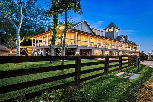 115 Holly St, Mandeville, LA 70448 - rear view of house with board and batten siding