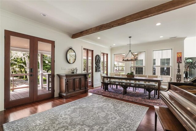 115 Holly St, Mandeville, LA 70448 - dining room featuring crown molding, dark wood-style floors, a chandelier, recessed lighting, and baseboards