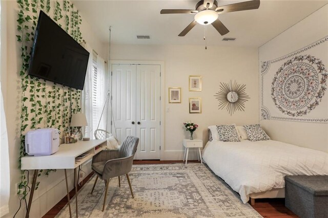 115 Holly St, Mandeville, LA 70448 - bathroom with toilet, a shower stall, wood finished floors, and vanity