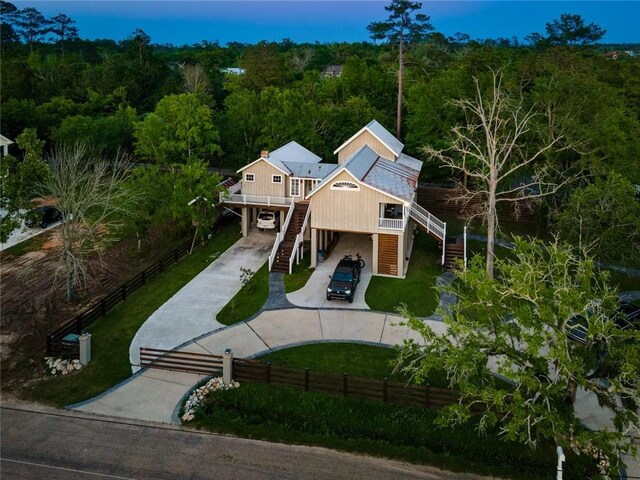 115 Holly St, Mandeville, LA 70448 - view of subject property with a forest