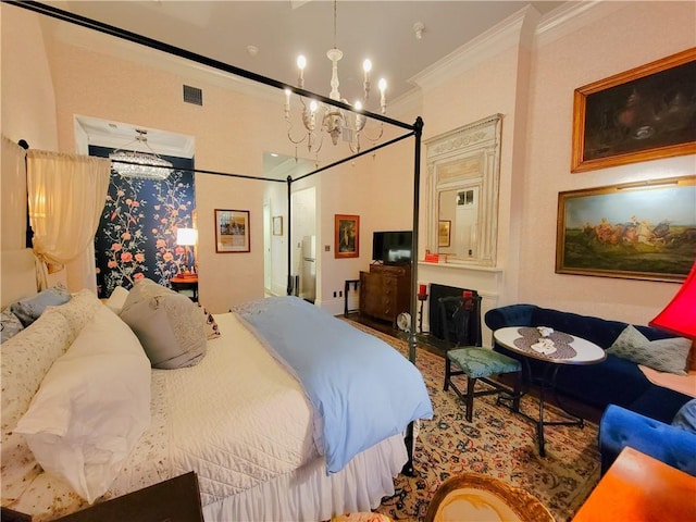 bedroom with crown molding and a notable chandelier