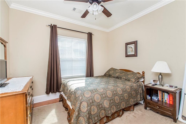 324 38th St, New Orleans, LA 70124 - bedroom featuring ornamental molding, baseboards, and a ceiling fan