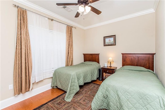 324 38th St, New Orleans, LA 70124 - bedroom featuring wood finished floors, ornamental molding, ceiling fan, and baseboards