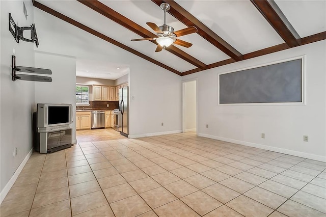 unfurnished living room featuring vaulted ceiling with beams, ceiling fan, and light tile patterned floors