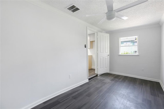 unfurnished bedroom with a textured ceiling, crown molding, dark hardwood / wood-style flooring, and ceiling fan