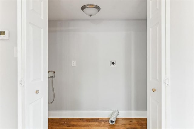 laundry area featuring hardwood / wood-style floors, electric dryer hookup, and hookup for a washing machine