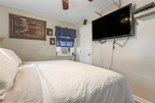 bedroom featuring ceiling fan