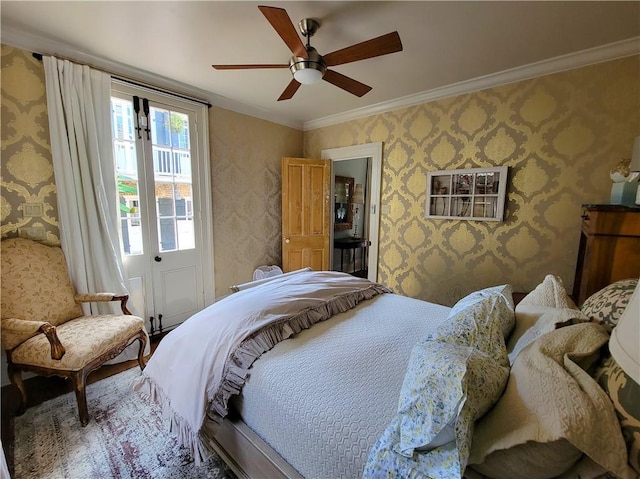 bedroom with ceiling fan and crown molding